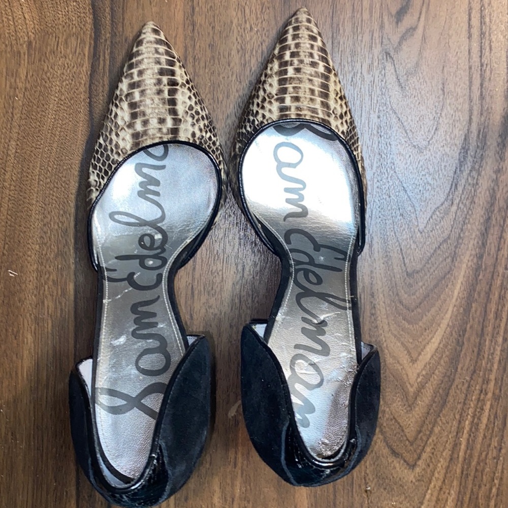 And tan snake like print size 9 Sam Edelman fits more like at 8.5.